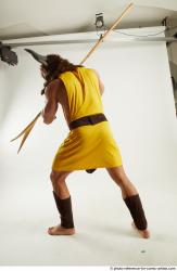 Man Adult Average Fighting with spear Standing poses Casual